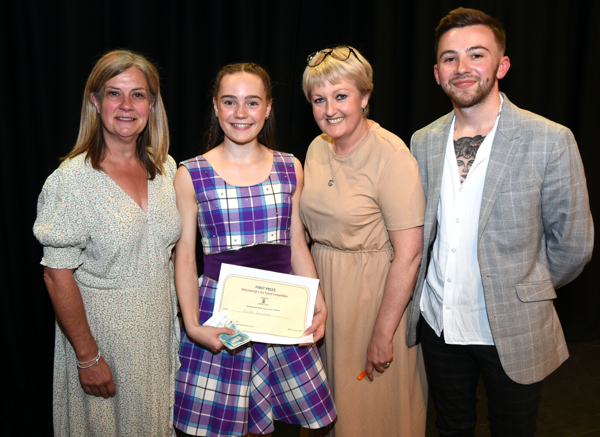 First prize winner Eilidh Gammons with judges Elspeth Davis, Donna Hicks and Nathan Press (Photo: Brian Averell)