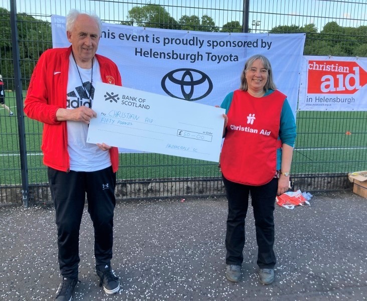 Ardencaple FC makes their donation to Christian Aid