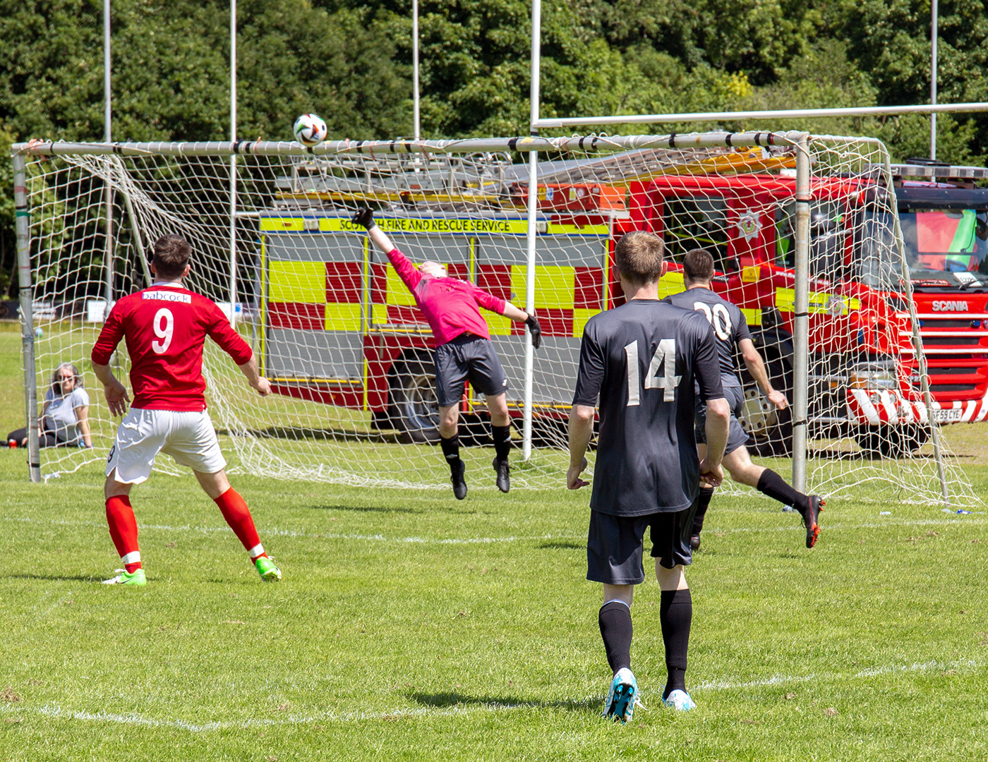 The charity match of firefighters raised about £1,100