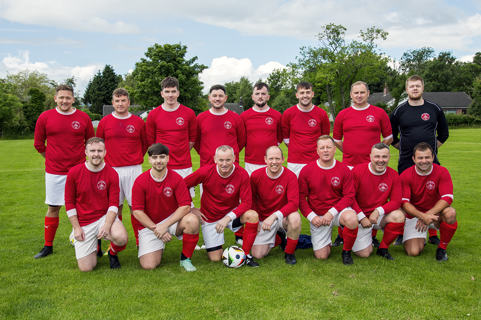 The teams pose for a photo before the battle commences