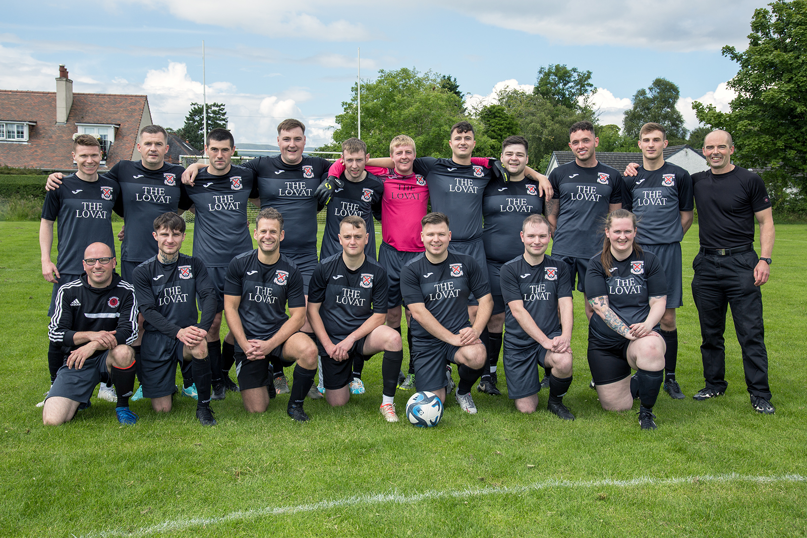 The teams pose for a photo before the battle commences