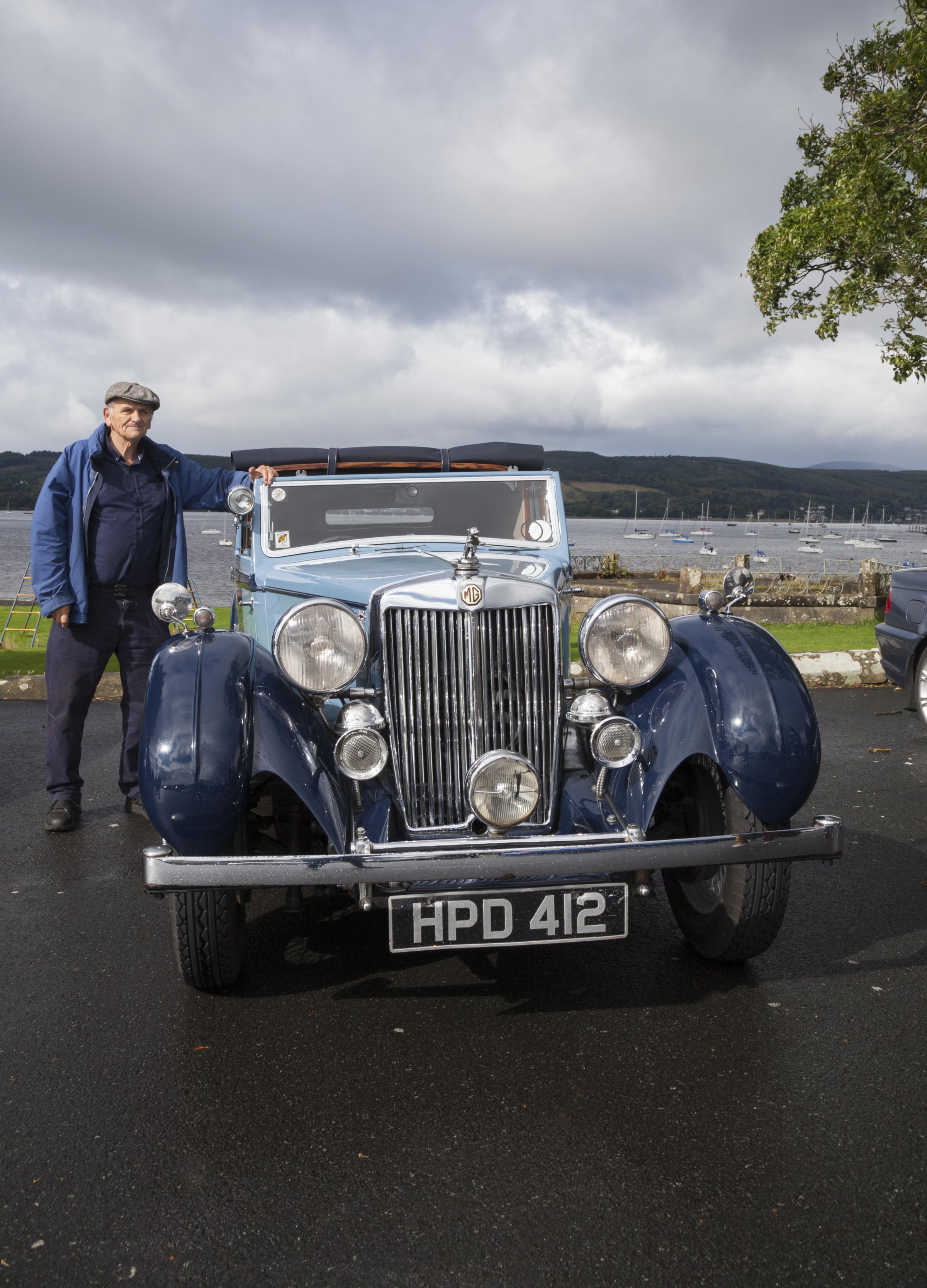 Alex McDougall with is MG. Worked in heavy engineering during his career and at the age of 80 does all his own maintenance.