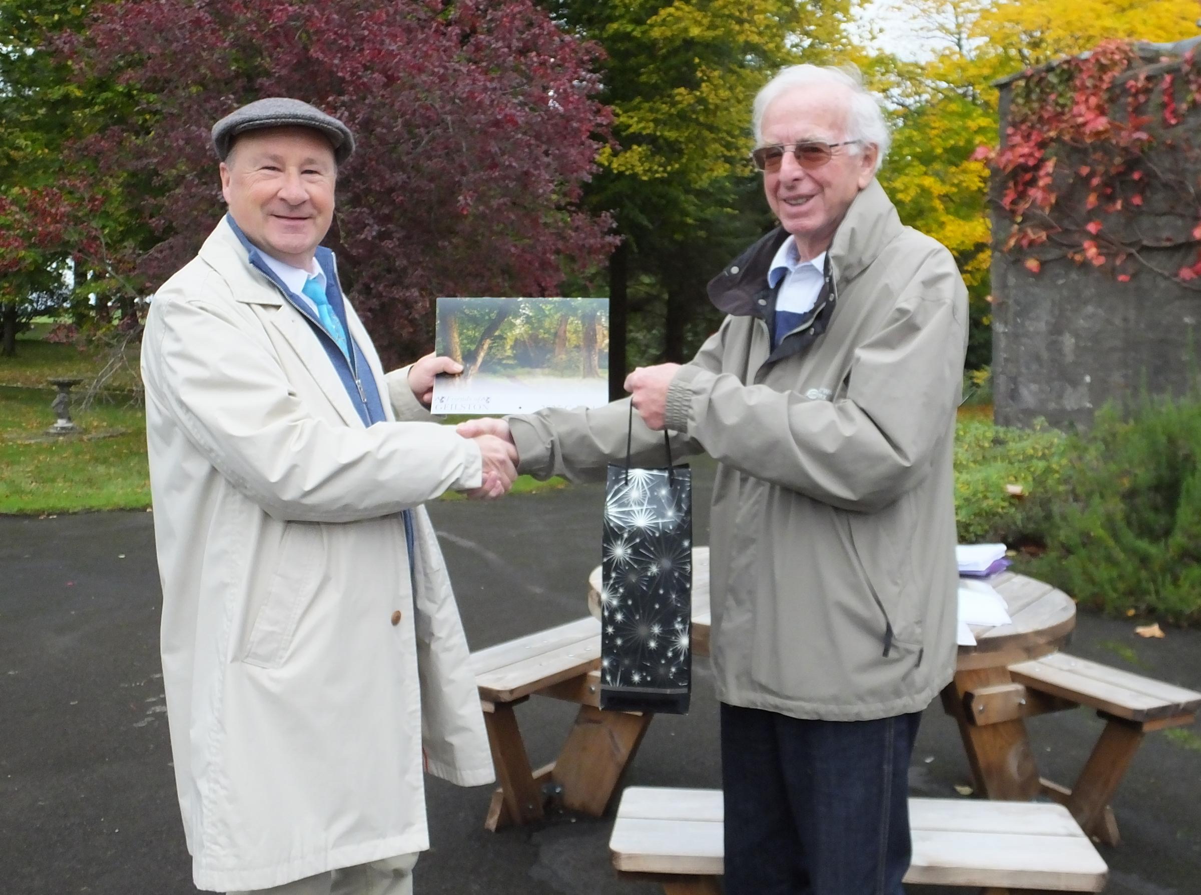 Judge getting presented with a thank you token