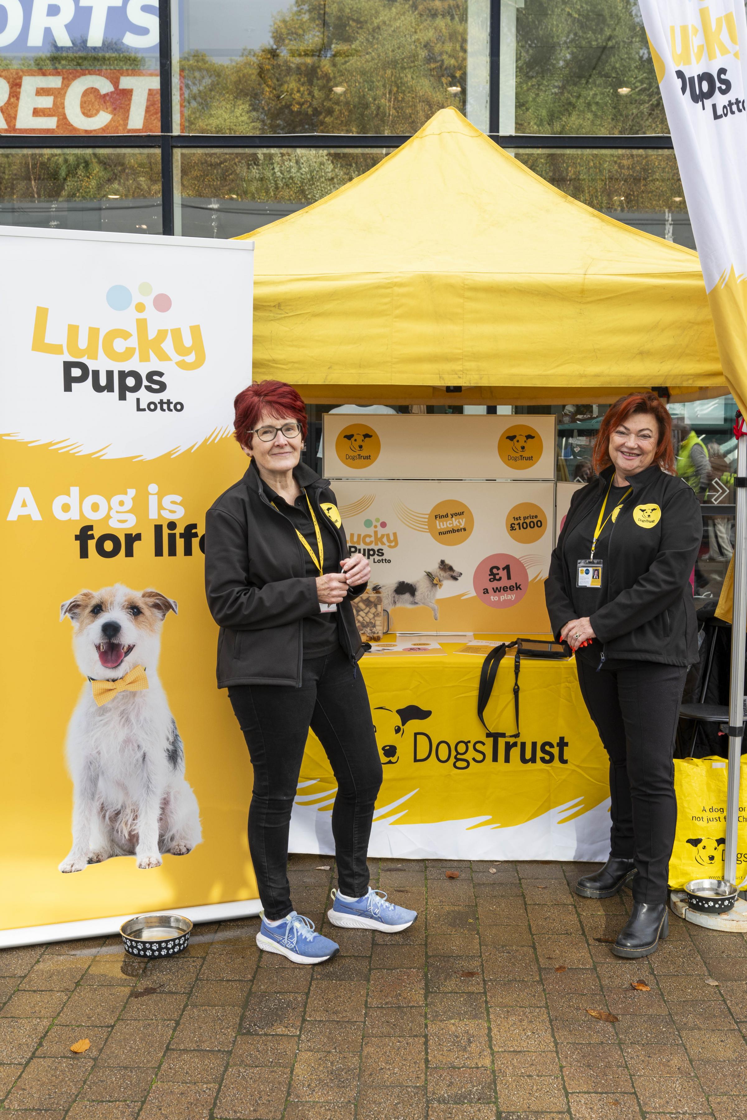 Lynn Harley and Jackie Ramsay Fraser with Dogs Trust chatting to the public about their new Lucky Pups Lotto helping them look after a much larger group of dogs that havent been individually sponsored