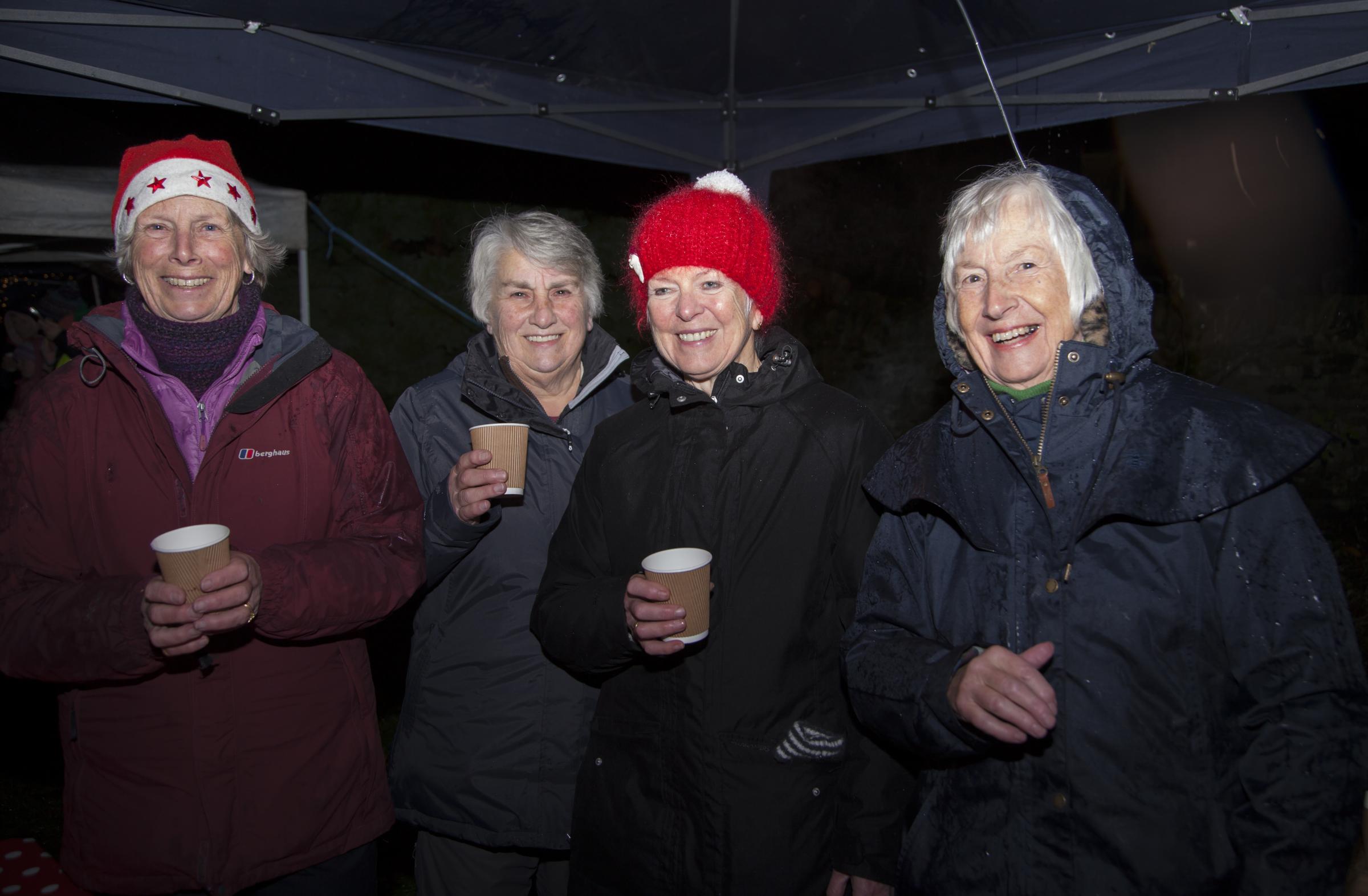 Ladies of Rhu and Shandon Parish Church handing out hot chocolate. Donations for the church tower restoration fund.