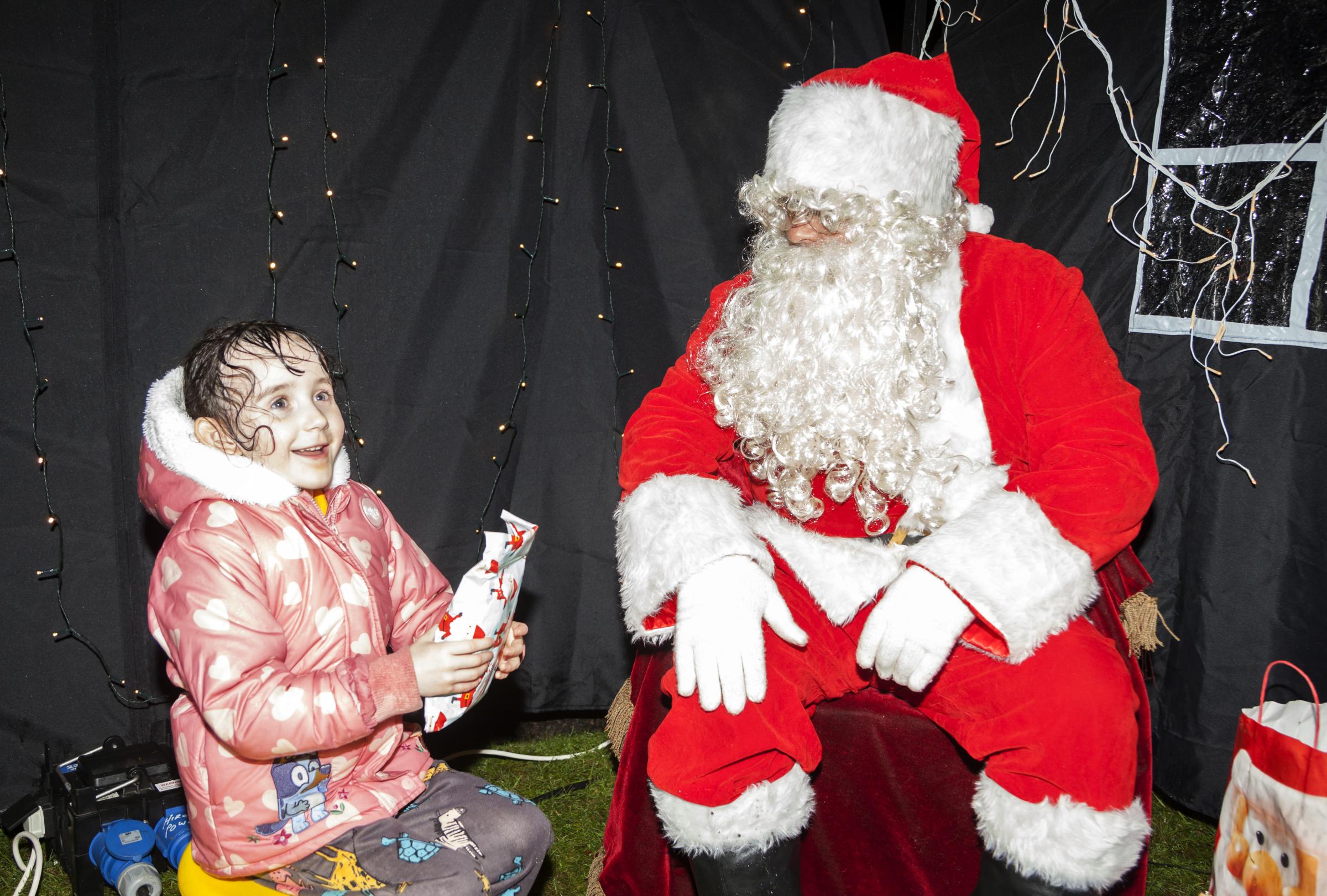 Jessie meets Santa. Rhu Lights Switch on