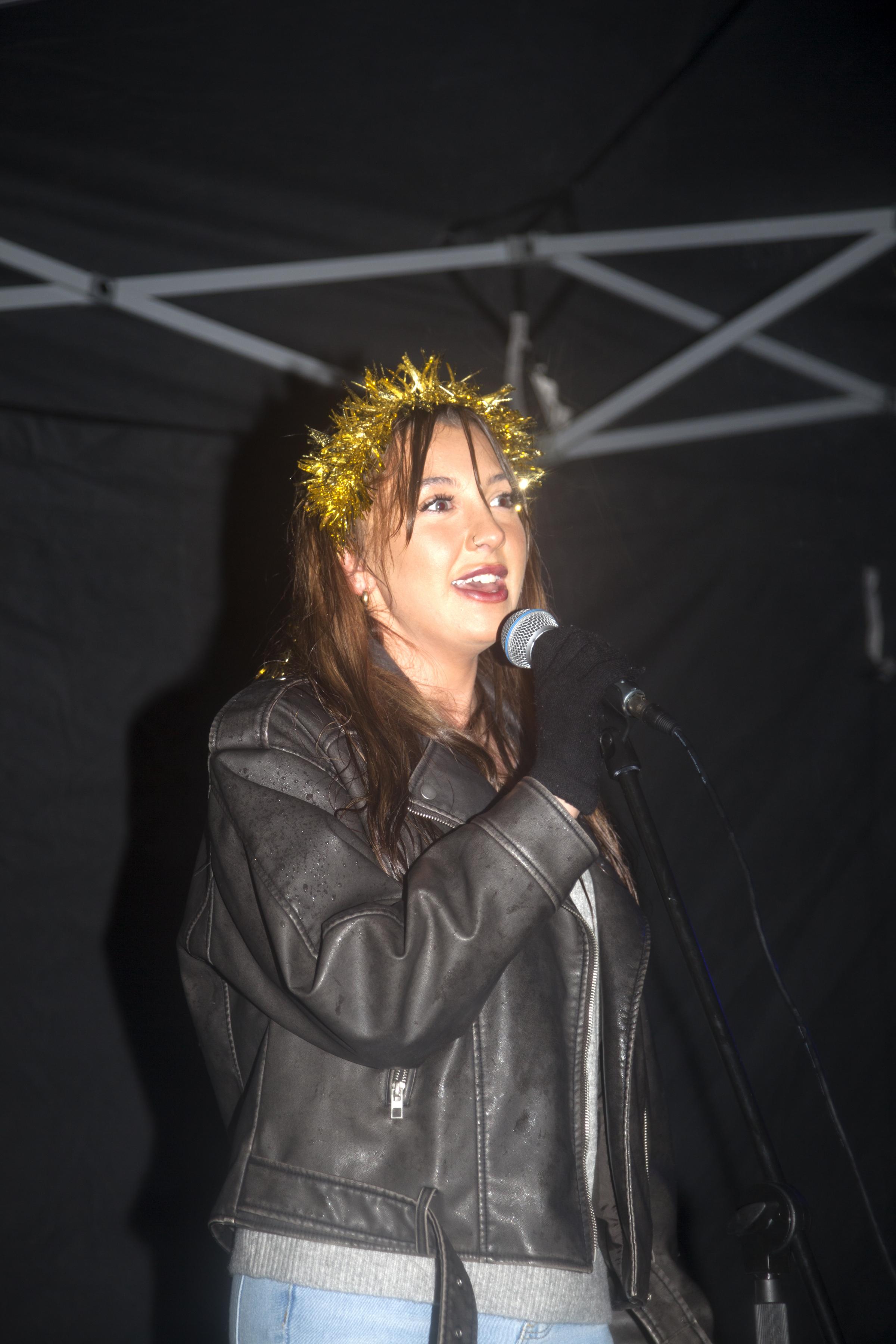 Leah Muir entertains the crowds at Rhu light switch on