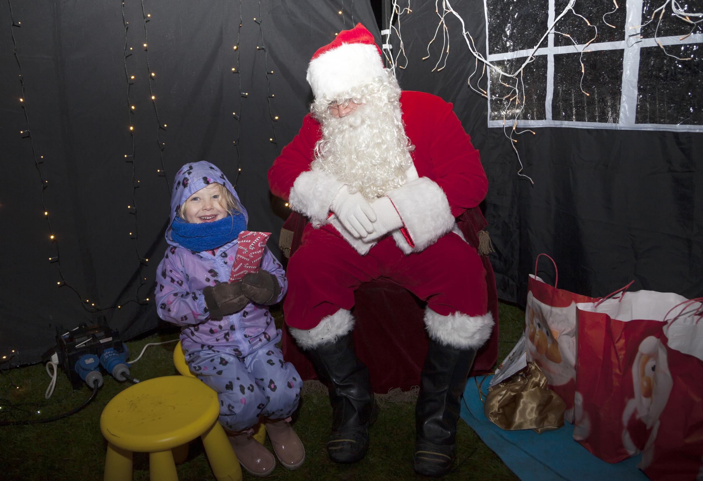 Mara Ormsby meets Santa at rhu Light Switch on.